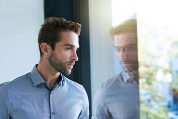 Poster - Window, business and man in office thinking or ideas for startup company or career in corporate. Male employee, serious and reflection to wonder or dream for entrepreneurship, planning and vision.