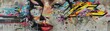 © Wavezaa - A graffiti of a woman face with bright colors