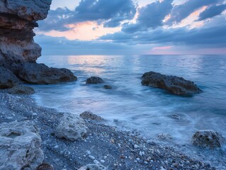 Wall Mural - A view of a rocky shoreline with some rocks and water. Generative AI.