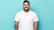© Rachel Yee Laam Lai - joyful young hispanic plus size body positive male man boy guy 30s in white blank design casual t-shirt posing color background studio portrait, ai