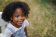 © Art_Photo - Portrait happy african american cute girl smiling face looking at camera at home, kid, child, young adorable, student, elementary school and education concept