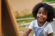 © Art_Photo - Portrait happy african american cute girl smiling face looking at camera at home, kid, child, young adorable, student, elementary school and education concept