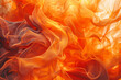 Close up of vibrant orange and red fire formed by delicate fluid organza fabric abstract wallpaper background