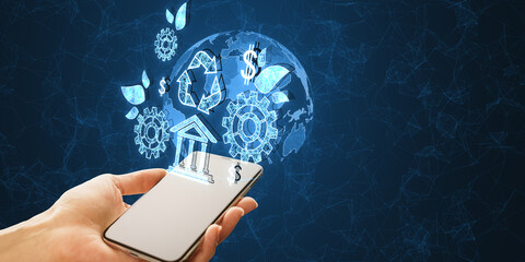 Wall Mural - Close up of female hand holding cellphone with creative esg hologram on polygonal blue background with mock up place. Business and organization, Environment, Social, Governance concept.