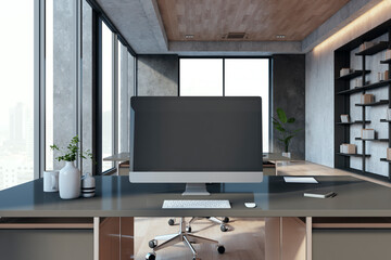 Poster - Close up of empty mock up computer monitor in modern office interior with windows and city view, bookcase and other items. 3D Rendering.