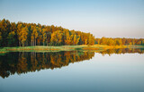 Fototapeta Natura - Impressive views of untouched wildlife and a magical lake on a sunny day.