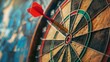Precision and focus symbolized by a red dart perfectly hitting the bullseye of a dartboard.