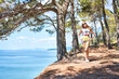Young woman hiking at the beach of Black sea