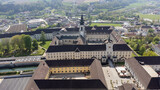 Fototapeta Miasta - Kremsmünster, Upper Austria, Austria - 04.13.2024: monastery of Kremsmünster in Upper Austria, aerial photography
