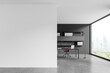 Stylish workspace interior with desk and shelf, panoramic window. Mock up wall