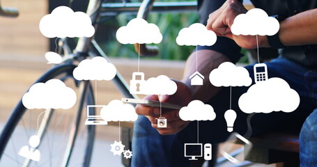 Poster - Image of clouds with electronic devices over caucasian man using smartphone