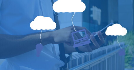 Poster - Image of clouds with electronic devices over caucasian man using smartphone