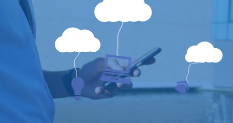 Poster - Image of clouds with electronic devices over caucasian man using smartphone