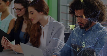 Poster - Globe of digital icons over diverse male and female office colleagues using electronic devices