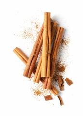 Poster - Dry aromatic cinnamon sticks and powder isolated on white, top view