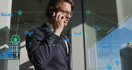 Poster - Image of data processing over caucasian businessman talking on smartphone