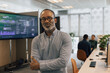 © ReeldealHD images - Portrait of a successful African american mature adult businessman in an office