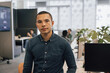 © ReeldealHD images - Portrait of a new employee in a modern corporate office