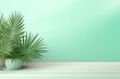 Mint Green background with palm leaf shadow and white wooden table for product display, summer concept