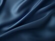 Navy Blue background with subtle grain texture for elegant design, top view. Marokee velvet fabric backdrop with space