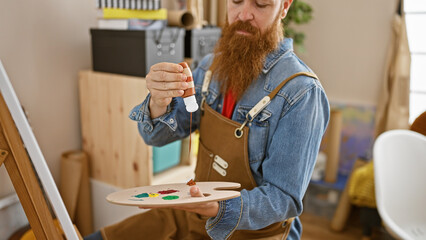 Wall Mural - Enthralling irish redhead artist pouring vibrant colors onto his palette in a bustling art academy studio