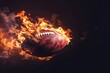 Burning American football ball with bright flame flying on black background