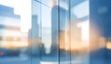 Blurred Glass Wall Of Modern Business Office Building At The Business Center Use For Background In Business Concept. Blur Corporate Business Office. Abstract Windows With A Blue Tint