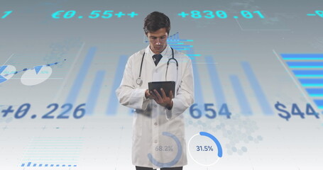 Sticker - Image of financial data and graphs over caucasian male doctor