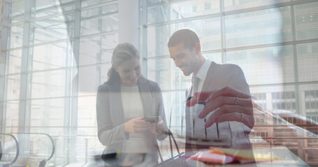 Sticker - Image of caucasian businesswoman shaking hands and using computer