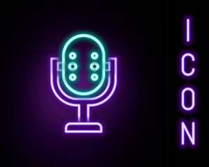 Poster - Glowing neon line Microphone icon isolated on black background. On air radio mic microphone. Speaker sign. Colorful outline concept. Vector