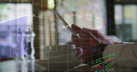 Poster - Image of stock market data processing over mid section of a man using digital tablet at a cafe