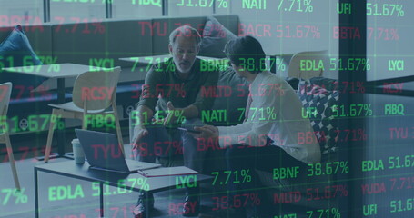 Poster - Image of stock market data processing over two diverse men discussing over a laptop at office