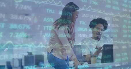 Canvas Print - Image of stock market data processing over diverse man and woman discussing at office