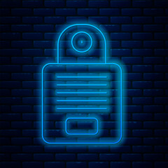 Poster - Glowing neon line Intercom icon isolated on brick wall background. Vector