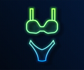 Wall Mural - Glowing neon line Summer beach swimsuit icon isolated on blue background. Beach women fashion. Vector