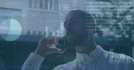 Poster - Image of financial data processing over caucasian man using smartphone