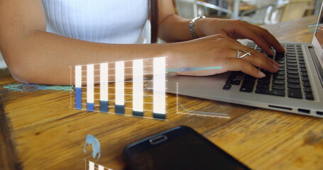 Poster - Image of graphs, globes, computer language, midsection of caucasian woman working on laptop