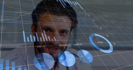 Poster - Image of financial data processing over caucasian businessman in office