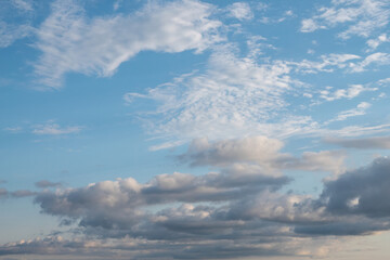 Wall Mural - blue sky with white and gray clouds