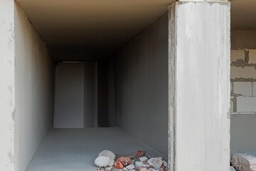 Canvas Print - empty concrete wall with construction site