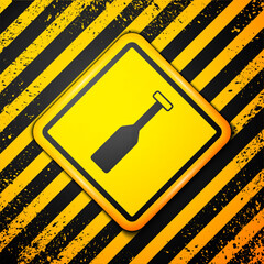 Canvas Print - Black Paddle icon isolated on yellow background. Paddle boat oars. Warning sign. Vector