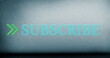 Image of subscribe text sparkling in blue with a green sparkling arrow against a blue blurred backgr