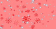 Image of snow falling over red background