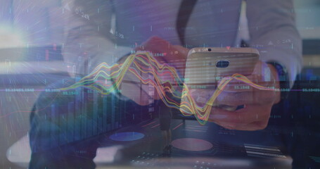 Poster - Image of graphs over hands of caucasian businessman using smartphone