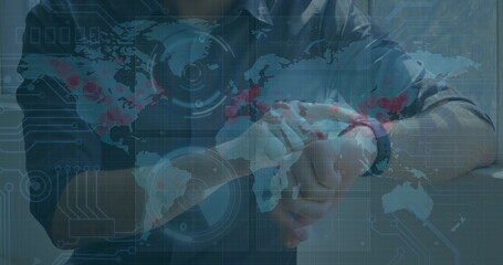 Poster - Image of data processing on screens over caucasian man checking smartwatch