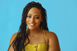 closeup portrait of smiling young beautiful african american woman braid hair posing at studio looking at camera