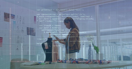 Wall Mural - Image of computer language and graph on biracial female designer checking design of dress