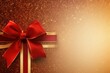 Red ribbon with bow on gold background, Christmas card concept. Space for text. Red and Gold Background