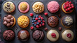 An assortment of gourmet desserts including cupcakes and tarts, decorated with fruits, nuts, and chocolate.