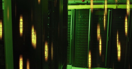 Poster - Glowing yellow lights and data processing over green lit, dark computer server room